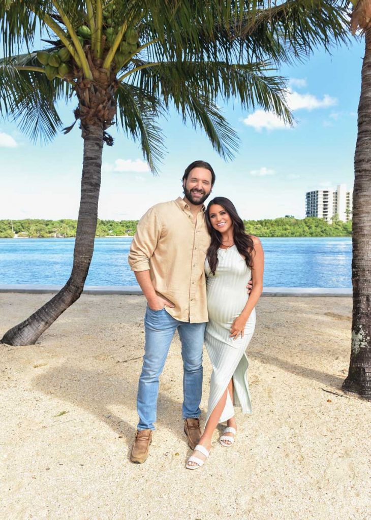 Ricky and MC by the Intracoastal near their home. Photography by Tracey Benson