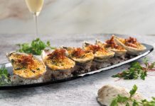Savor Fourth of July Dining at 1000 North Enjoy oysters Rockefeller during Social Hour at 1000 North. Photo by Michael Albanese